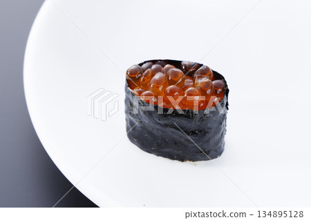 Fresh and delicious salmon roe gunkan Fresh and delicious salmon roe gunkan 134895128