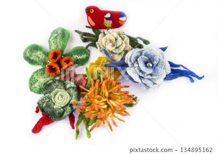 Brooch of fulled wool on white background 134895162