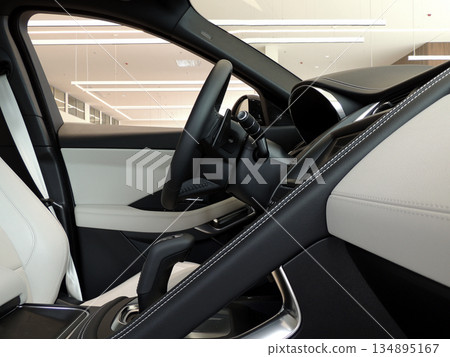 Side view of drivers seat, steering wheel and gear shift knob inside car  134895167