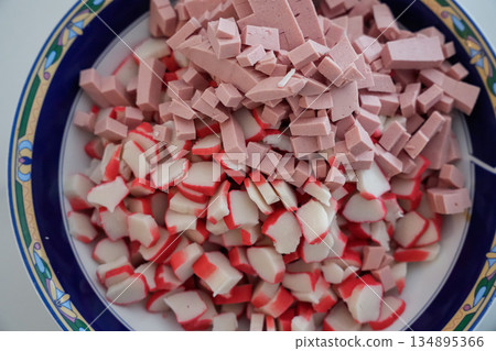 Close Up of Crab Sticks and Sausage in Bowl Close Up of Crab Sticks and Sausage in Bowl 134895366