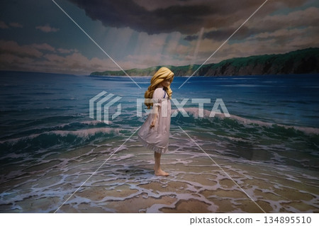 Golden Hair Maiden Beside Ocean Waves Golden Hair Maiden Beside Ocean Waves 134895510