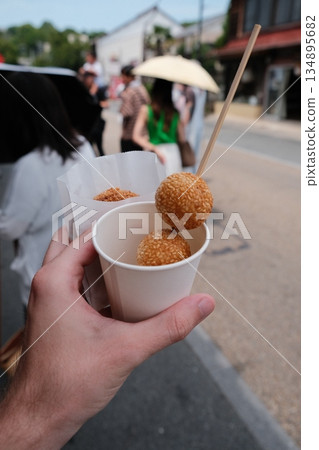 Golden Sesame Doughnuts Street Food Delight Golden Sesame Doughnuts Street Food Delight 134895682