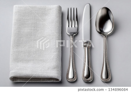 Wedding invitations. Set for everyday dining, Fork, knife and spoon on a white background. Dining settings. 134896084