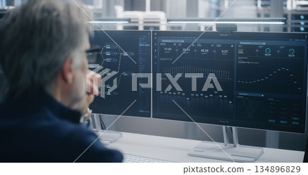 Data Scientist Wearing Glasses, Analyzing Cloud System Performance Graphs and Data Flow Data Scientist Wearing Glasses, Analyzing Cloud System Performance Graphs and Data Flow 134896829