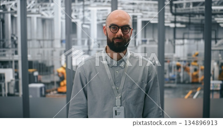 Bearded Engineer With Glasses, Looking Directly With Professional Demeanor Bearded Engineer With Glasses, Looking Directly With Professional Demeanor 134896913