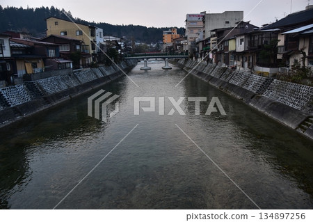 Takayama City, Gifu Prefecture, Japan - During the Takayama Spring Festival, the Miyagawa River flows through the city and the surrounding streets, with old Japanese houses and long-established inns Takayama City, Gifu Prefecture, Japan - During the Takayama Spring Festival, the Miyagawa River flows through the city and the surrounding streets, with old Japanese houses and long-established inns 134897256
