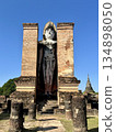 The UNESCO-listed upright statue at Wat Mahathat in Sukhothai Historical Park 134898050