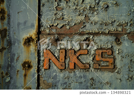 A rusty iron door that exudes history A rusty iron door that exudes history 134898321