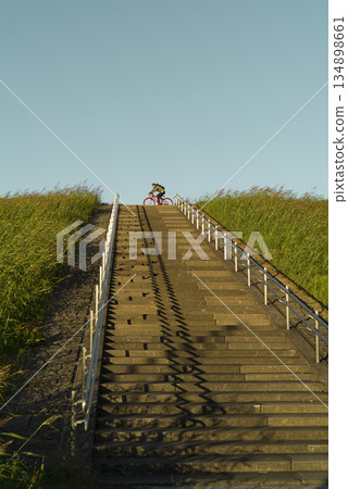 Embankment stairs and road bike Embankment stairs and road bike 134898661