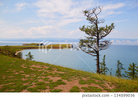 The shore of Lake Baikal on a summer day. Beautiful landscape. 134899036