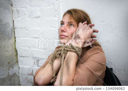 Young pretty sad bounded girl 134899062