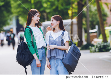 Female college student walking on campus Female college student walking on campus 134899133