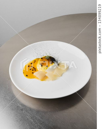 Refined dish featuring delicate scallops and citrus aroma Refined dish featuring delicate scallops and citrus aroma 134899219