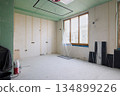Bright unfinished living room with large window, finishing stage 134899226