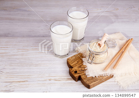 Sesame milk in glasses, sesame seeds in a jar Sesame milk in glasses, sesame seeds in a jar 134899547