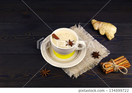 A cup of masala tea. Tradition Indian tea drink with milk and spices. 134899722
