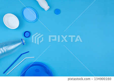 Plastic waste for recycling and reuse on blue background. 134900160