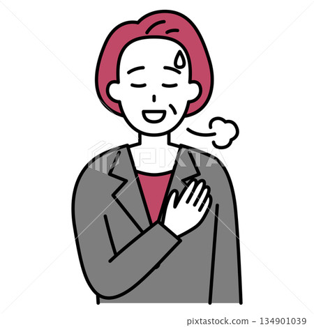 身穿西裝的中年婦女，將手放在胸口，感到如釋重負。 134901039