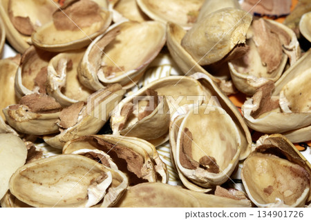 Close up of empty pistachio shells nuts 134901726