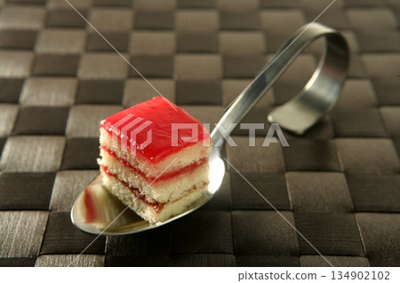 Pastries over spoon Pastries over spoon 134902102