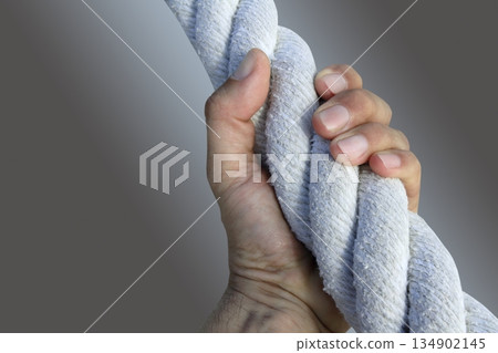 man hand grab grip strong big aged rope man hand grab grip strong big aged rope 134902145