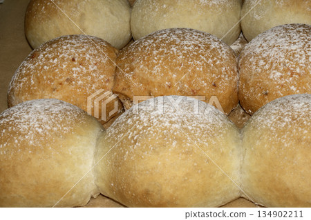 Close up of fresh baked homemade rolls buns breads golden 134902211