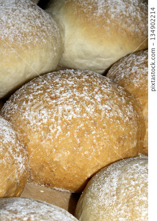 Close up of fresh baked homemade rolls buns breads golden 134902214