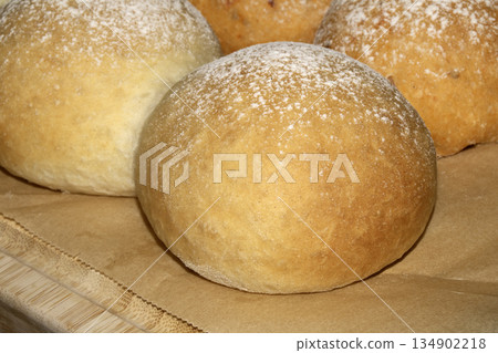 Close up of fresh baked homemade rolls buns breads golden 134902218