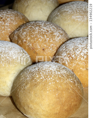 Close up of fresh baked homemade rolls buns breads golden 134902219