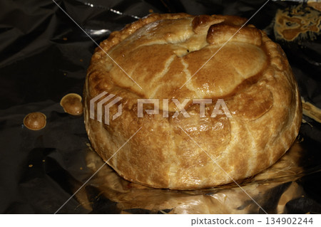 Close up of a glazed pastry home made pie just cooked 134902244