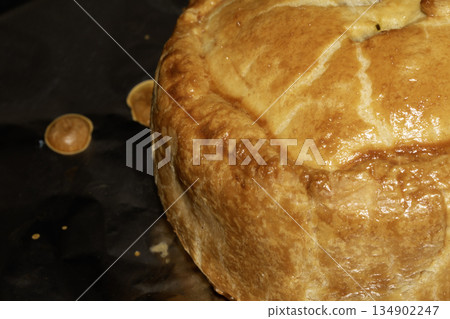 Close up of a glazed pastry home made pie just cooked Close up of a glazed pastry home made pie just cooked 134902247