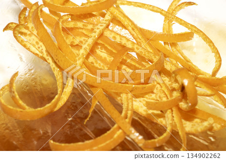 Close up of orange peel slices thin grated fruit 134902262