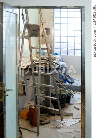 bathroom improvement with messy clutter 134902396