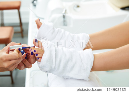 Pedicure nails polish blue in nail salon 134902585