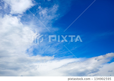 Blue sky with white clouds in a summer day 134902595