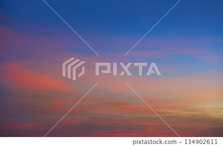 Sunset clouds in orange and blue 134902611