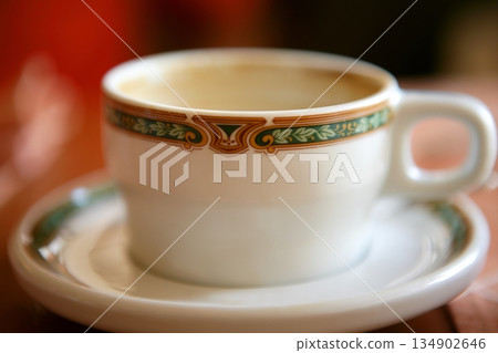 Dirty used coffe cup, white porcelain 134902646