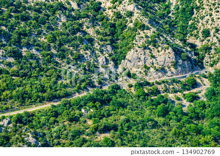 Road in mountains. 134902769