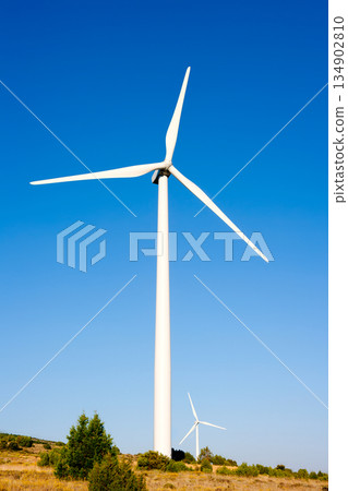 aerogenerator windmill in sunny blue sky 134902810