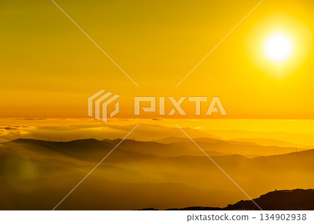 Burning sunset above clouds, Serra da Estrela, Portugal. 134902938