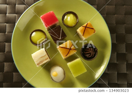 Pastries over green dish Pastries over green dish 134903023