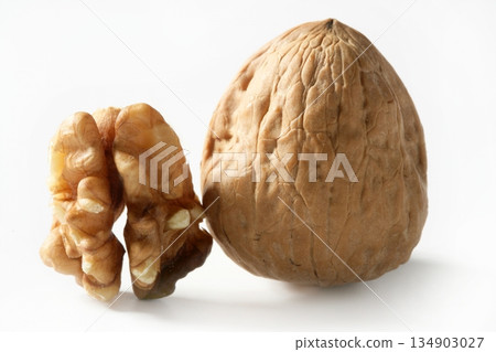 Walnut and shell macro over white 134903027