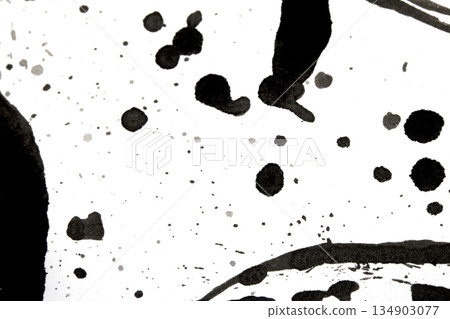 Distressed Monochrome Ink Circle Texture and Splatter Graphic on white background Distressed Monochrome Ink Circle Texture and Splatter Graphic on white background 134903077