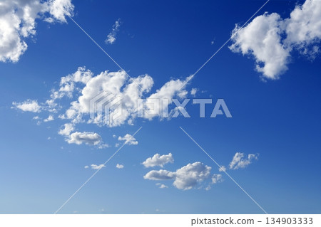 blue sunny day sky with clouds 134903333