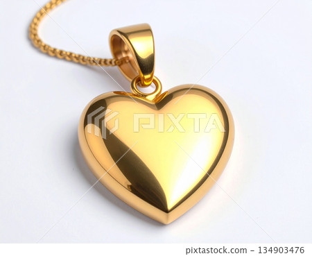 Greeting design. Metal heart-shaped keychain on white background. Greeting design. Metal heart-shaped keychain on white background. 134903476