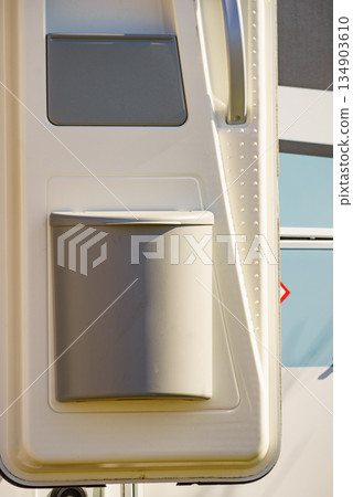 Camper door with trash can. Camper door with trash can. 134903610