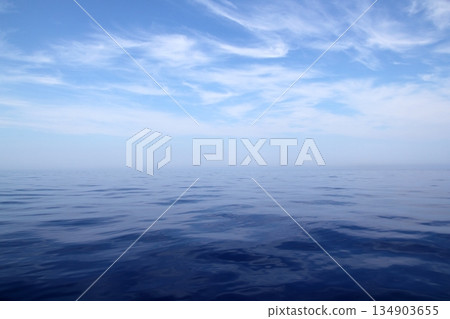 Calm sea blue water ocean sky horizon scenics 134903655