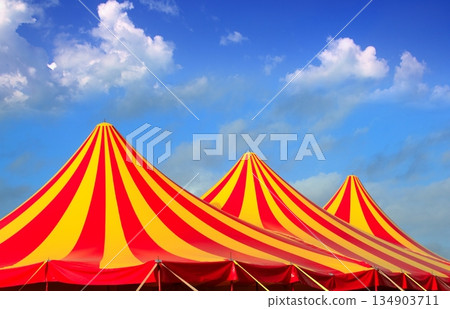 Circus tent red orange and yellow stripped pattern 134903711