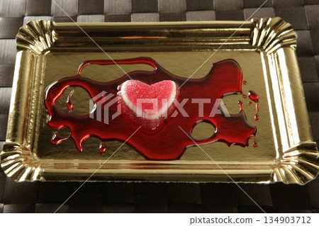 The menu is a heart in golden plate The menu is a heart in golden plate 134903712