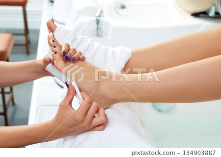 Pedicure dead skin remover feet care woman Pedicure dead skin remover feet care woman 134903887